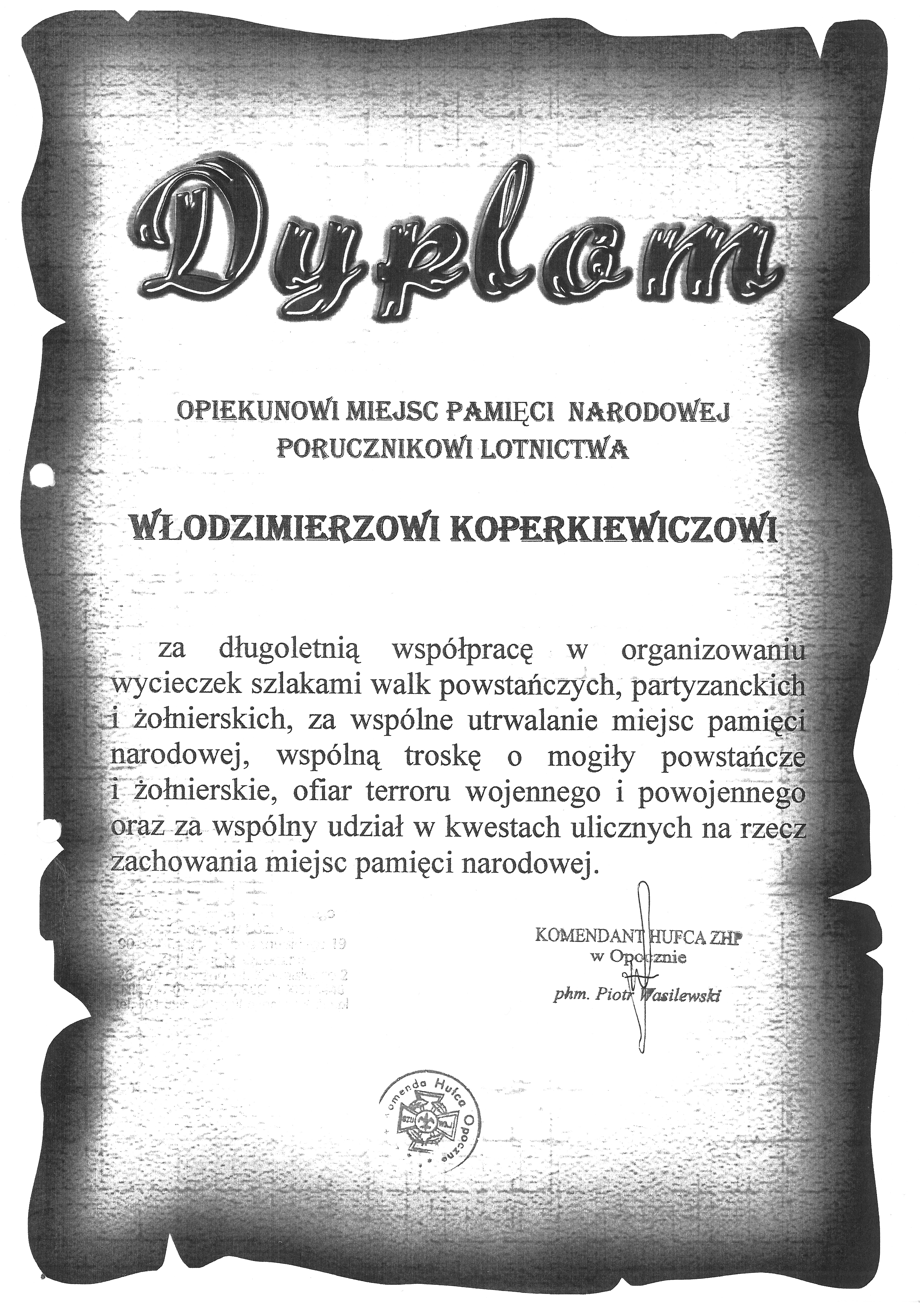 Dyplom uznania za działalność społeczną dla Włodzimierza Koperkiewicza.